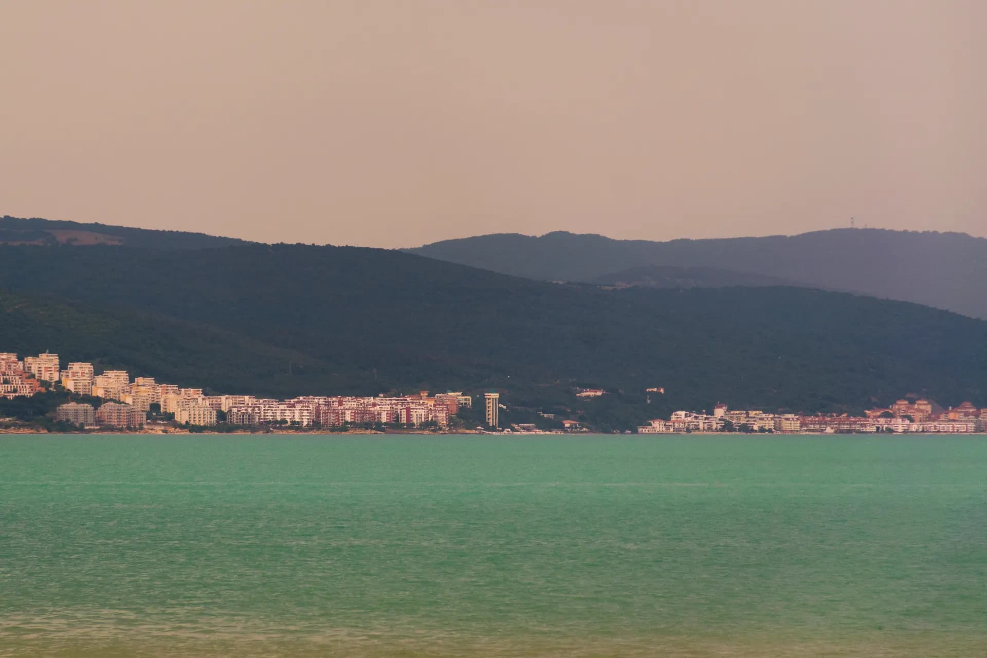 a city next to a body of water