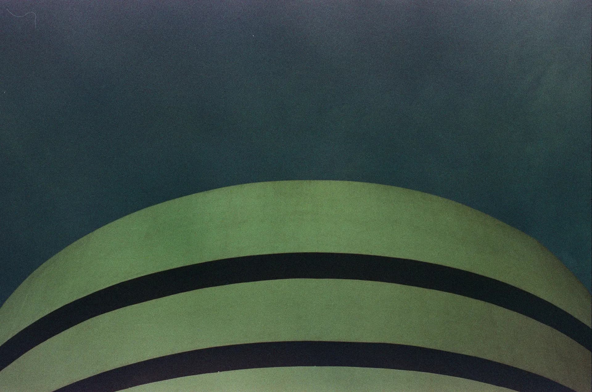 green and black striped textile
