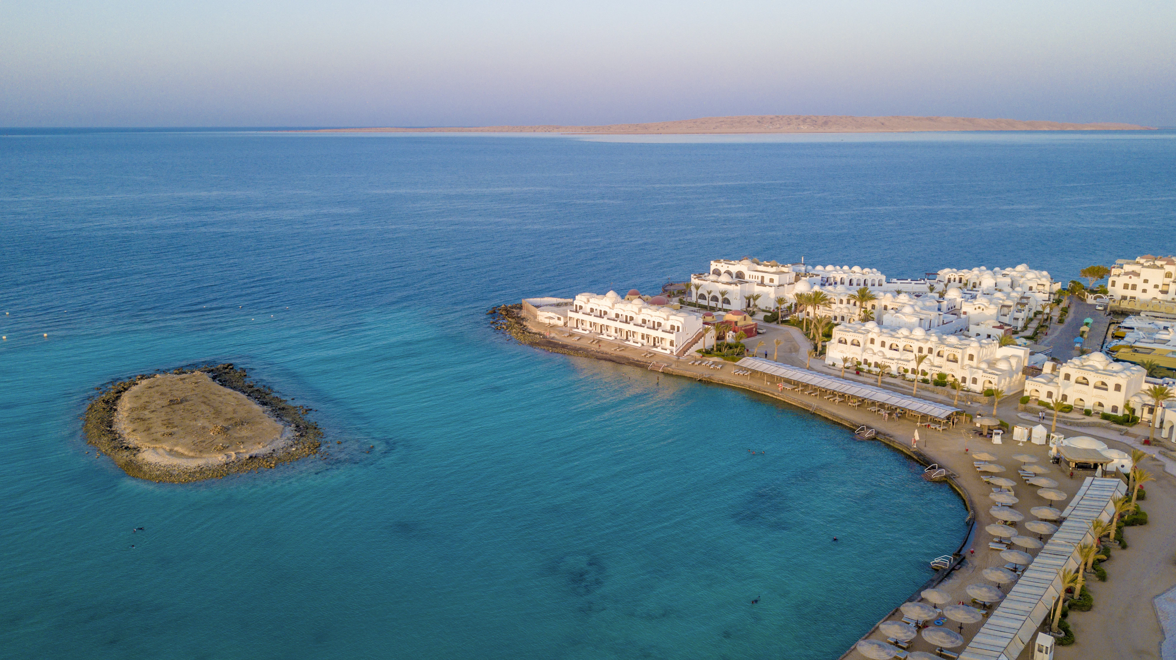 A bird's eye view of a resort on the water