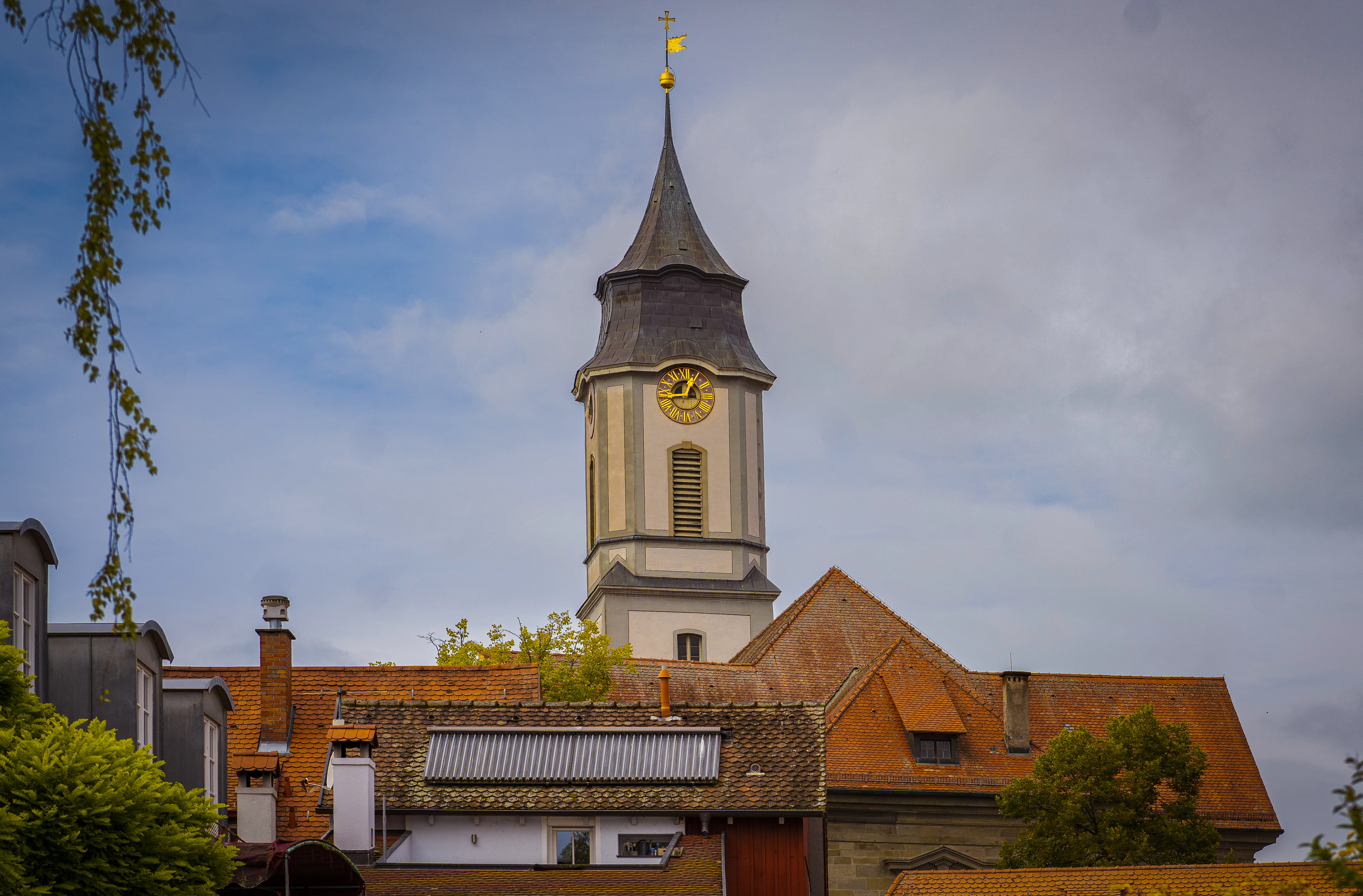 A building with a clock on the top of it