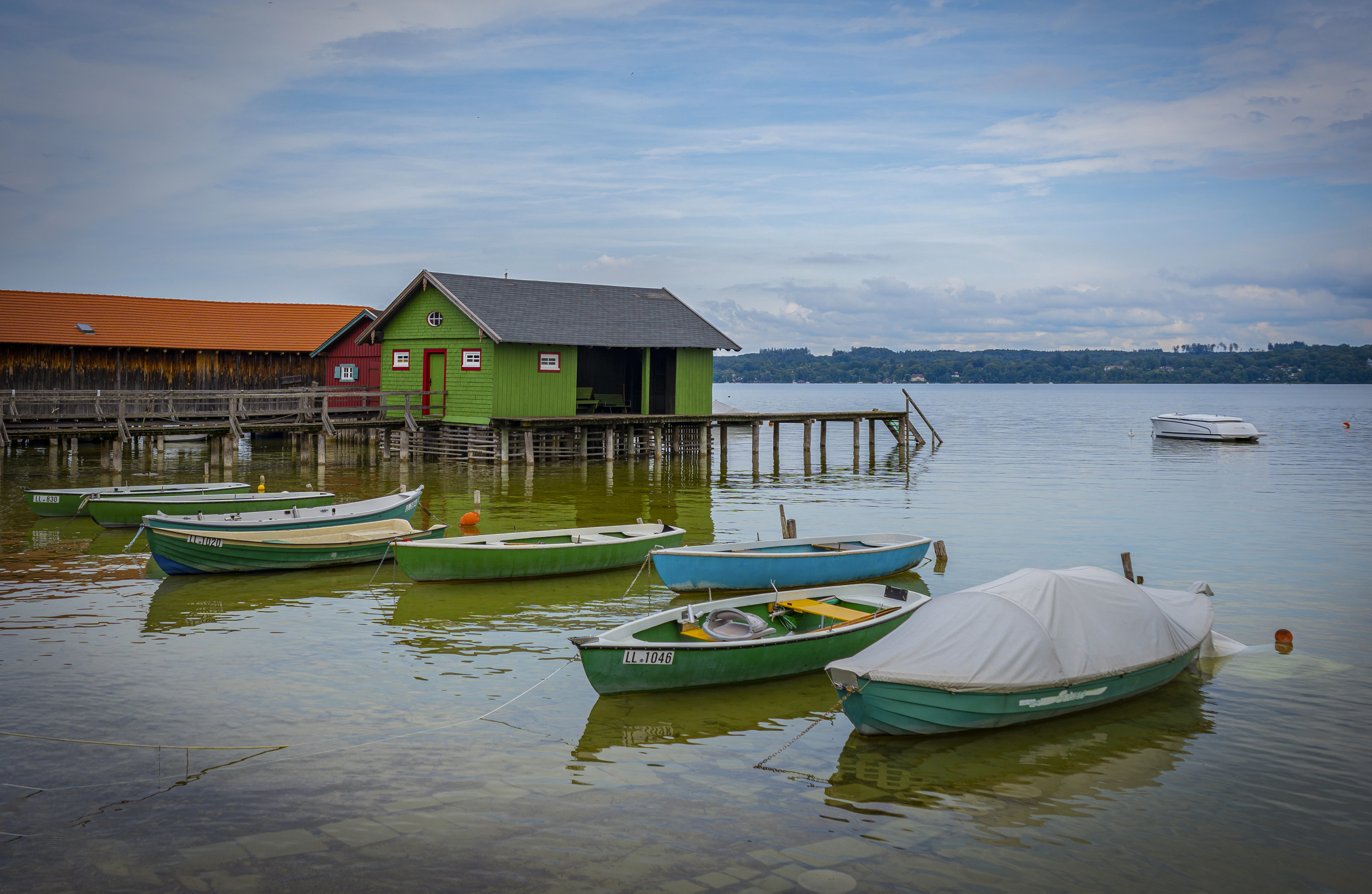 A number of small boats in a body of water