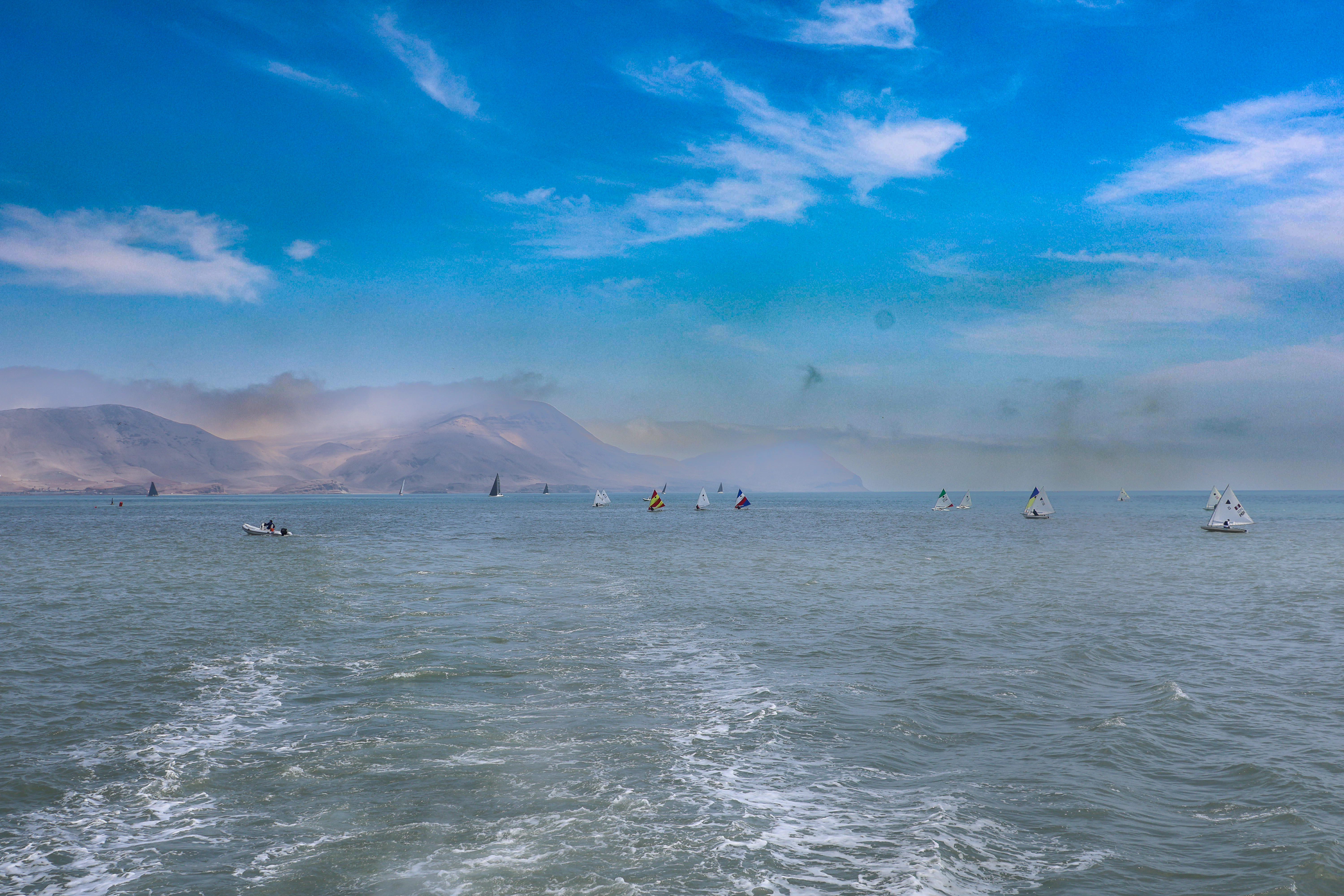 A large body of water filled with lots of boats