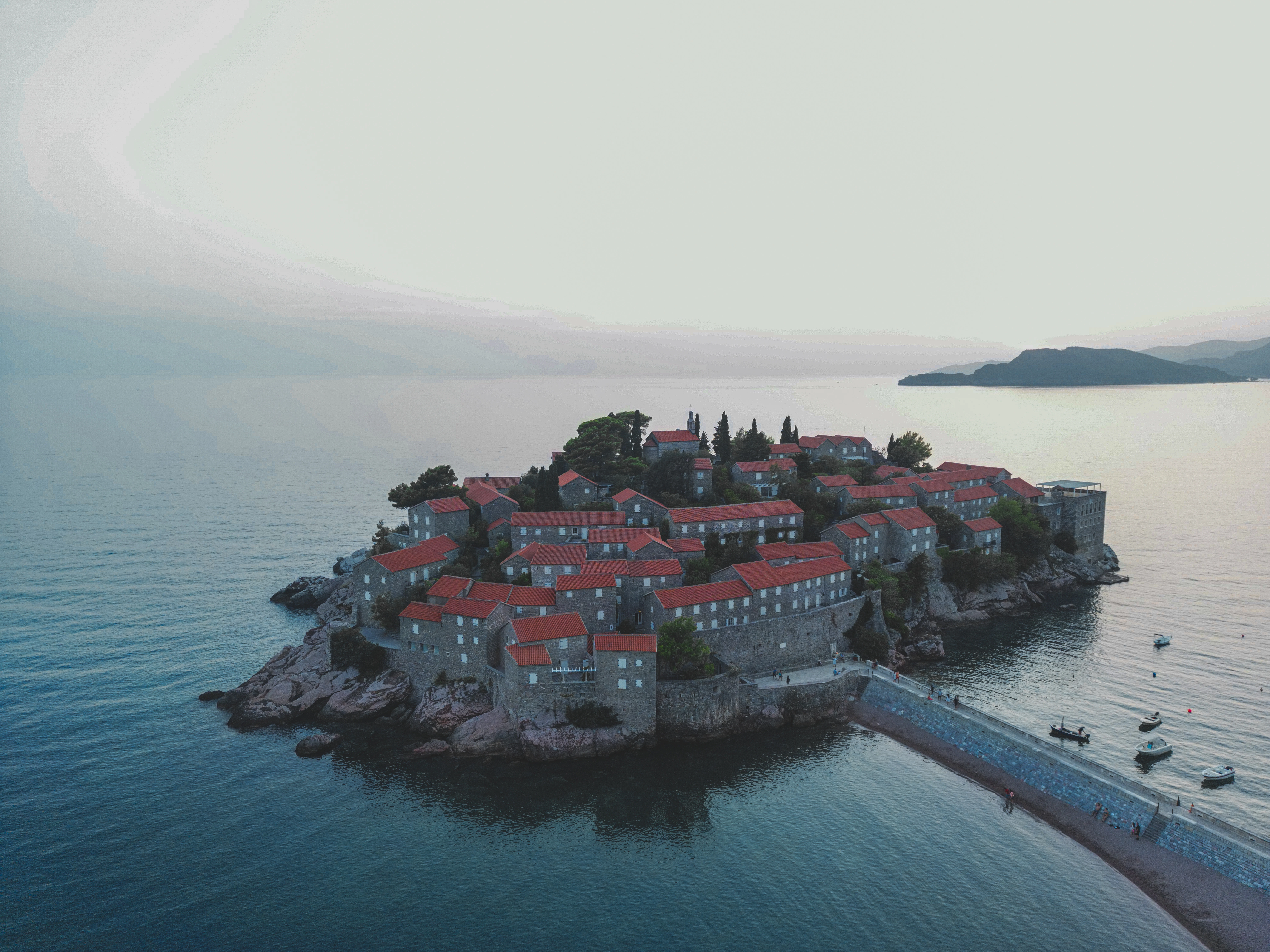 an aerial view of a small island in the middle of the ocean