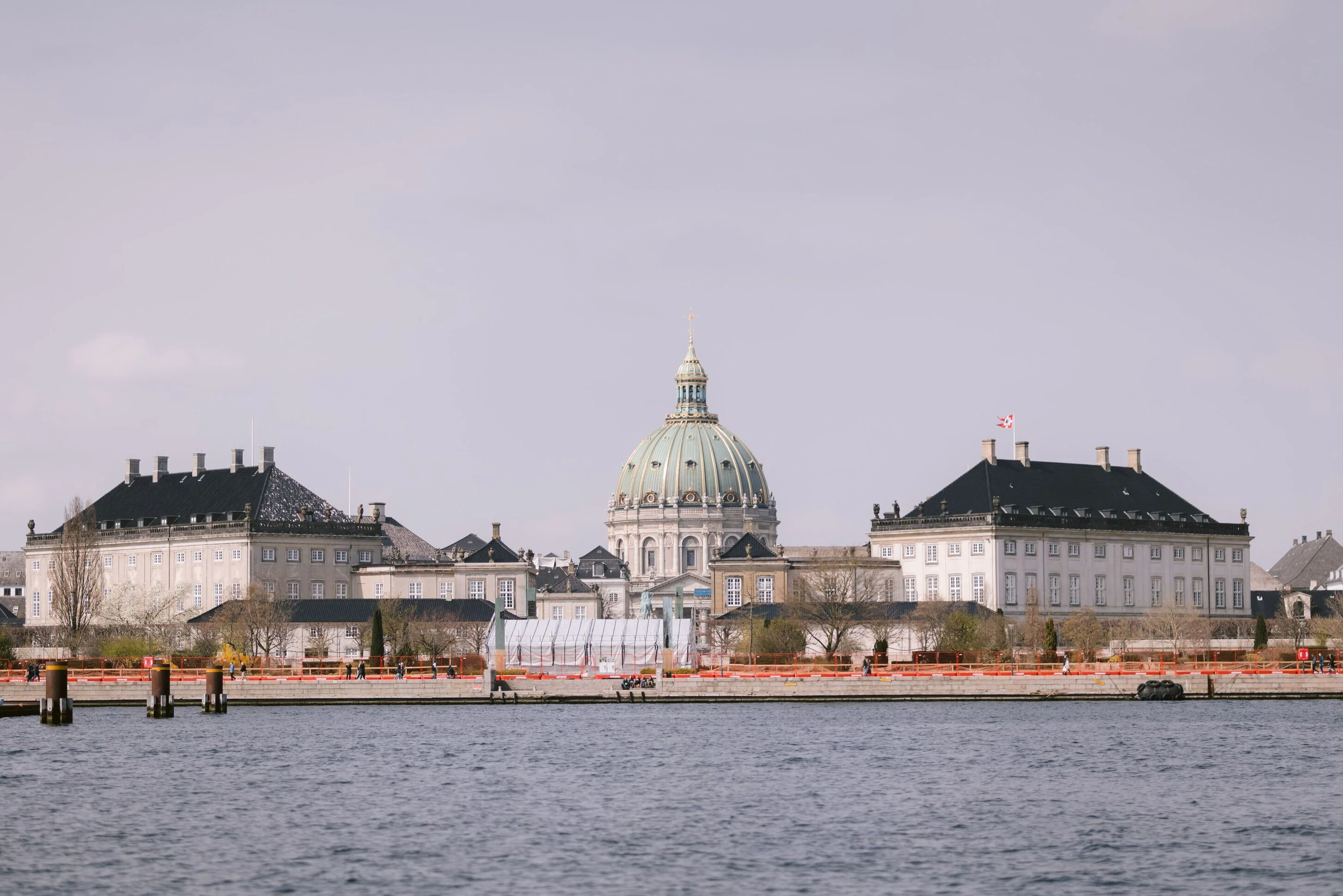 Modern building with dome by the water