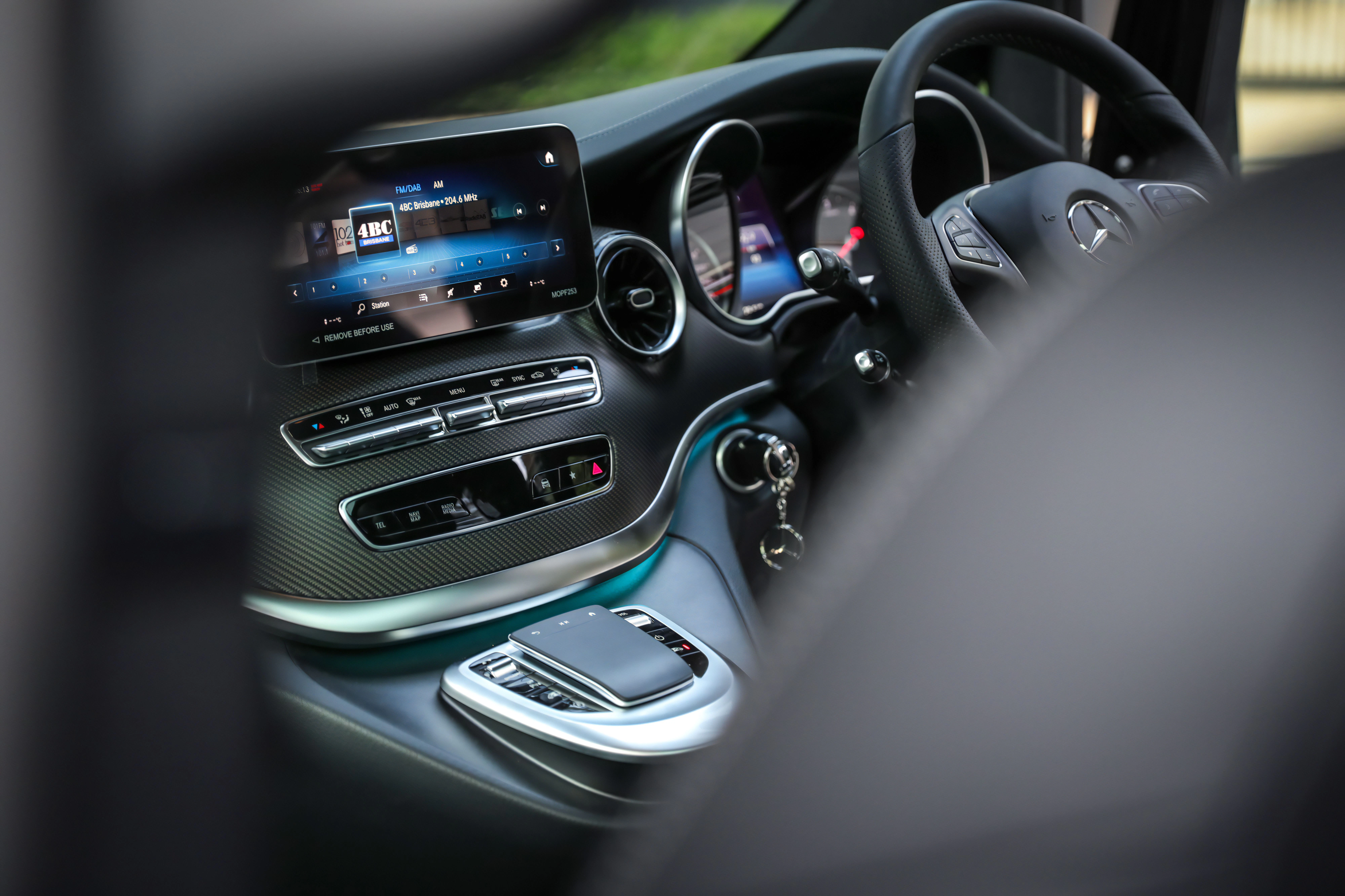 View of the dashboard of a car's interior.